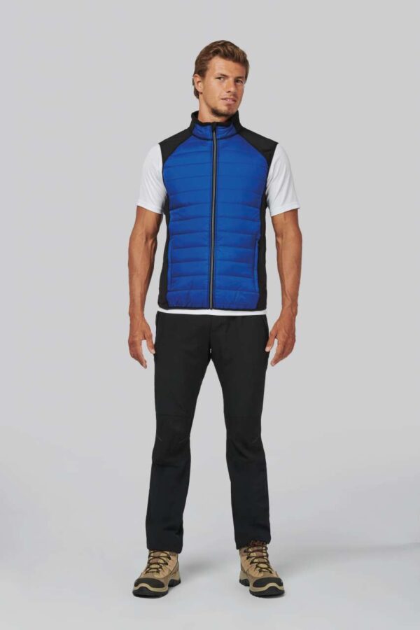 DUAL-FABRIC SLEEVELESS SPORTS JACKET